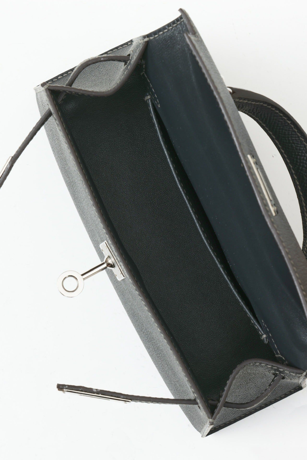 Inside view of the Mini Leather Elegance handbag by Lorvien Maison showcasing its sleek interior and premium finish.