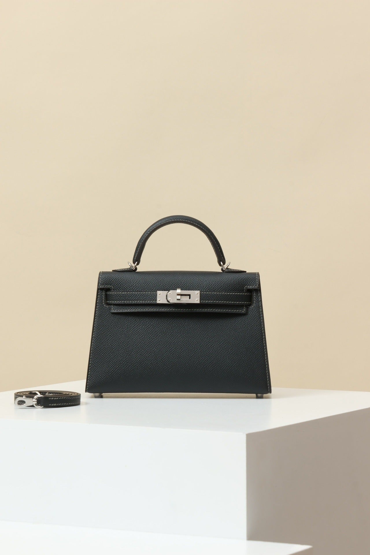 Mini Leather Elegance by Lorvien Maison luxury handbag on display, showcasing its elegant design and premium materials.