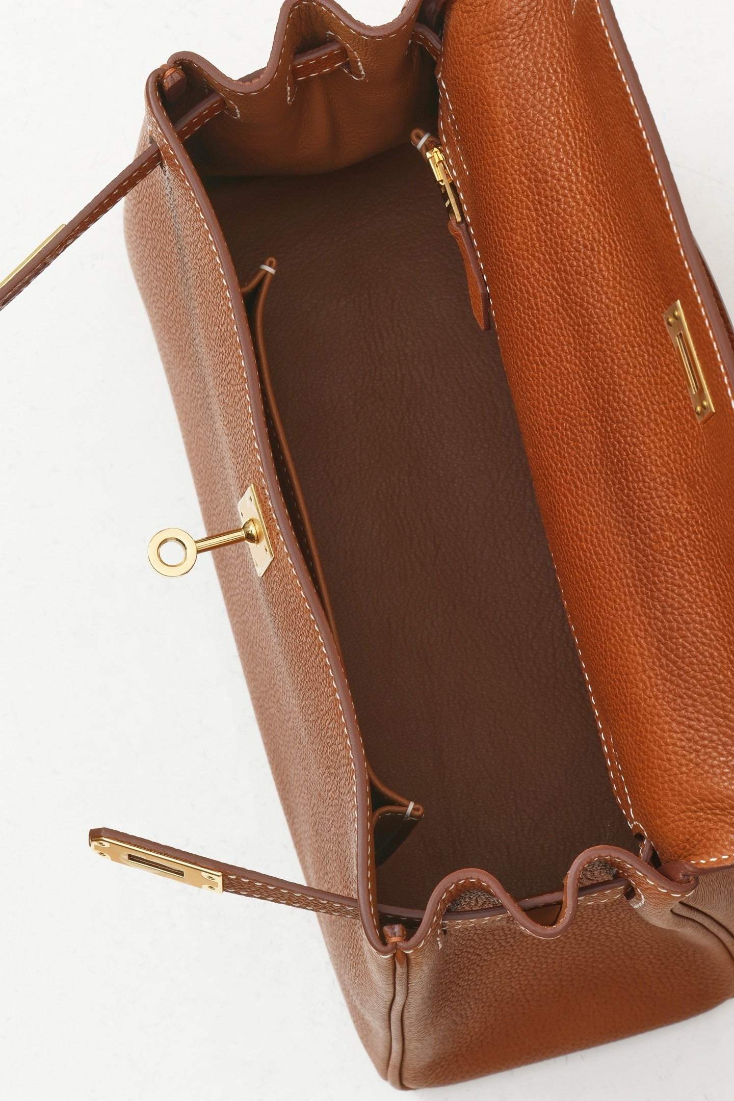 Interior view of the Refined Leather Elegance, showcasing premium leather finish and organized space.